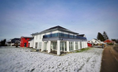 Charakter trifft Komfort: Neuwertiges Mehrfamilienhaus mit verstecktem Potenzial in idyllischer Lage