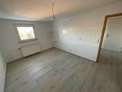 Suchen Sie eine zentral gelegene 2-Zimmerwohnung mit Wohnküche? Dann haben wir was für Sie!