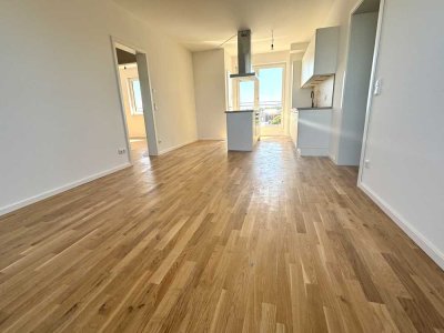 Erstbezug mit Stil: 4-Raum-Wohnung mit moderner EBK, Balkon und 2 Bädern