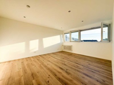 Stilvoll modernisierte Wohnung in saniertem, gepflegtem Wohnensemble – mit Balkon und Garage