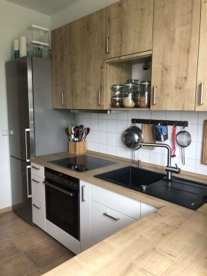 EBK-Abkauf möglich. 3-Zi.-Whg. im 1. OG am Heimgarten mit Stellplatz