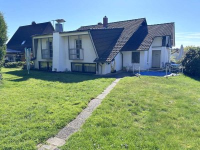 KL–Wiesenthalerhof: Gepflegtes Wohnhaus mit 2 Garagen und schönem Grundstück