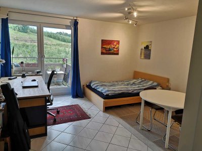 Geschmackvolle Wohnung mit eineinhalb Zimmern sowie Balkon und Einbauküche in Friedrichshafen-Berg