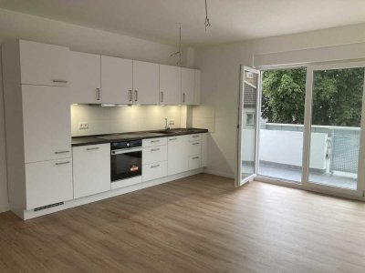 Neubau-Erstbezug im Hofhaus in zentraler, aber ruhiger Lage, mit Einbauküche (befristet auf 2 Jahre)