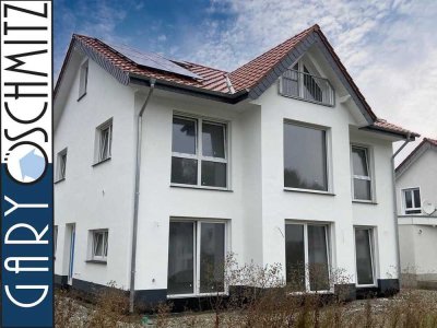 Einfamilienhaus mit Einliegerwohnung
- Neubau / Erstbezug -