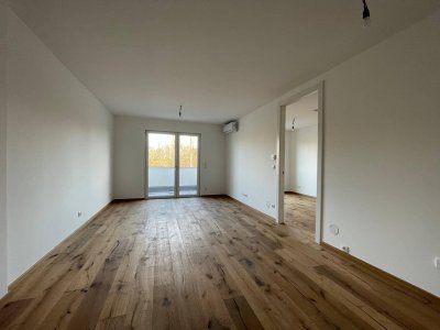 Dachgeschosswohnung mit Blick ins Grüne – stilvoll wohnen am Waldrand
