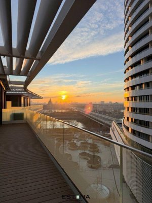 Sonnenuntergang über der Donau und Stephansdom