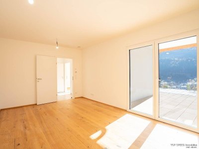 Erdgeschosswohnung in Bestlage – Zwei Schlafzimmer mit Sonnenterrasse &amp; herrlichem Panorama.
