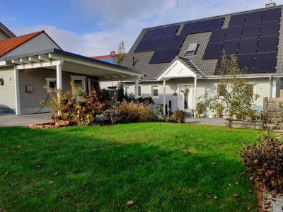 Traumhaus vereint Panoramausblick, sonnendurchflutete Räume u. großzügigen Wintergarten