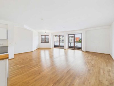 Barrierefreie, lichtdurchflutete Wohnung mit Einbauküche, großem Balkon & Duplex-Stellplatz
