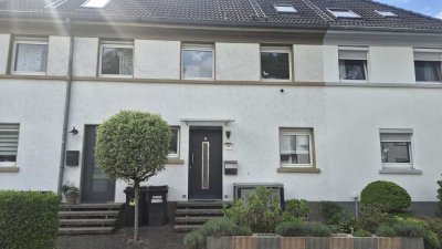 Reihenmittelhaus mit großzügiger Terrasse und familienfreundlicher Raumaufteilung