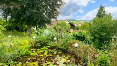 Wohnen & investieren im Grünen – gepflegtes Haus mit vielen Nutzungsmöglichkeiten & Gartenparadies