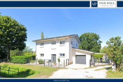 Architektur für gehobene Ansprüche mit geschmackvoller Gartenanlage