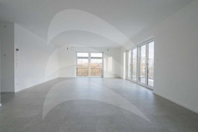 Erstbezug: Hochwertige Dachgeschosswohnung in KfW40-QNG-Bauweise mit Südbalkon