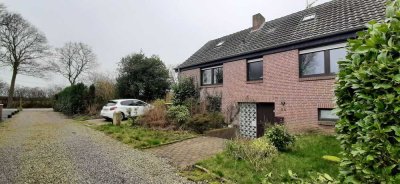 Reiheneckhaus mit großer Garten und Garage.