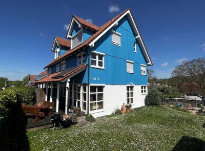 Stylisches Holzhaus – Doppelhaushälfte mit top Energieeffizienz