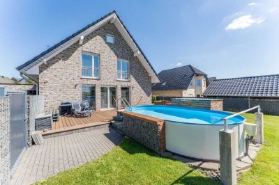 Modernes Einfamilienhaus mit Wohlfühlcharakter – mit Pool, Sauna und großem Garten
