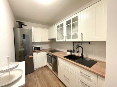 Urbaner Komfort trifft auf ruhige Wohnqualität: 2 Zimmer, Aufzug, TG-Stellplatzoption, Innenhoflage