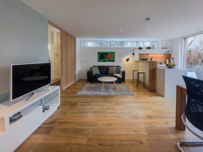 Moderne und geschmackvolle voll möblierte EG-Wohnung (65 m²) mit Terrasse/Garten