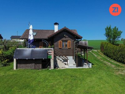 Pucking: Blockbohlenhaus mit sonnigem Freizeitgrundstück in ruhiger, idyllischer Lage!