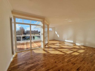 Großzügige 3-Zimmer-Wohnung mit Wintergarten, privater Dachterrasse und Blick ins Grüne