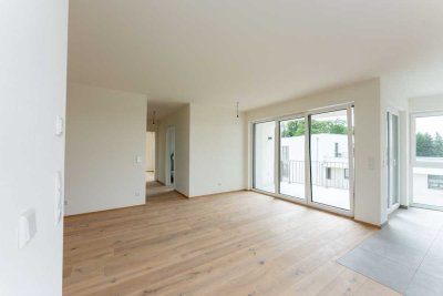 Stilvolle Gartenwohnung mit hochwertiger Ausstattung, eigenem Garten, Einbauküche, Loggia & TG