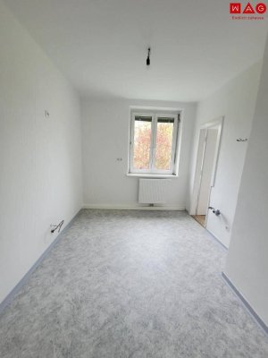 Ländliches Wohnen in zentrumsnaher Lage! Einladende 2-Zimmer Wohnung mit Balkon und idealer Raumaufteilung! Optimale Infrastruktur!
