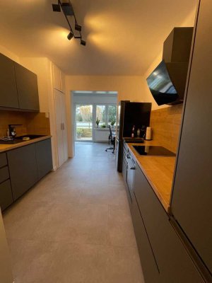 Schöne 2,5-Zimmerwohnung mit Terrasse und Garten im gepflegten Mehrfamilienhaus