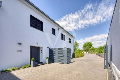 Stilvolles Einfamilienhaus mit Einliegeroption, großem Garten und modernster Energieversorgung