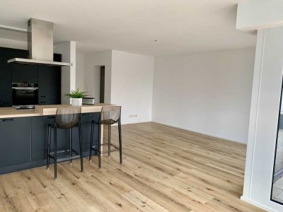 Moderne 4.5 Zimmer Wohnung mit EBK und TG-Stellplatz - die Alternative zum Haus