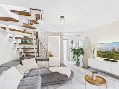 Helle Maisonettewohnung mit großem Balkon und Garage in zentraler Lage