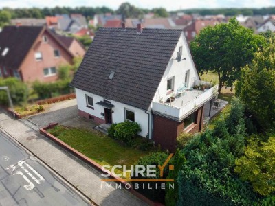 Ihr neues Zuhause mit großem Garten – Familienidylle in beliebter Lage von Hollage