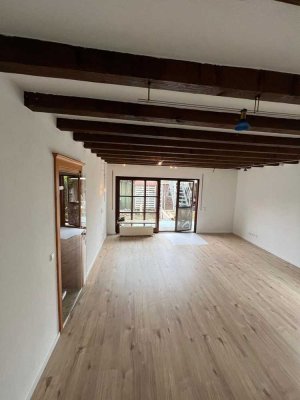 Attraktive, helle 3-Zimmer-Wohnung mit Terrasse & Garten