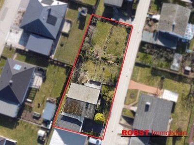 Einfamilienhaus mit ausgebautem Souterrainbereich - vielseitig nutzbar mit Garten und Garage