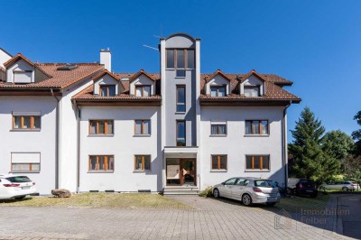 Zentrale 4-Zimmerwohnung im Erdgeschoss mit Tiefgaragenstellplatz