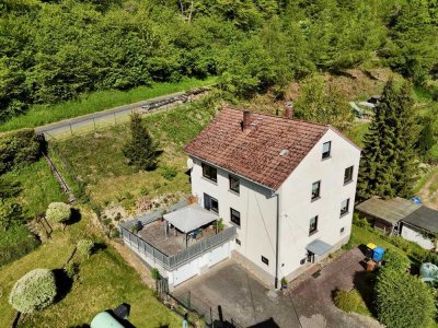 Schlangenbad-Niedergladbach: Ein 2-Familienhaus in Waldrandlage mit Potential!