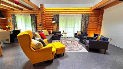 Ein Stück Natur zum Wohnen – moderner Blockhaus-Traum in Calbach