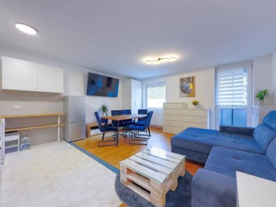 Gepflegte 2-Zimmer Wohnung mit 9m² Balkon und Tiefgaragen-Stellplatz