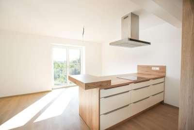 Top Lage: Moderne private Gartenwohnung - Erstbezug