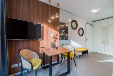 Stilvoll möbliertes Single-Apartment mit Gartenterrasse