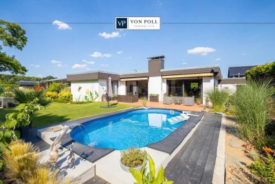 Modernisierter Bungalow mit Einliegerwohnung, Pool und Garten