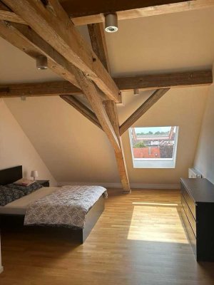 Charmante Maisonette-Wohnung mit Sichtbalken und modernem Flair