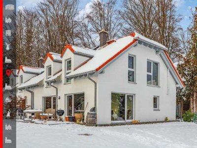 Exklusives Wohnerlebnis am Waldrand: Neuwertige Doppelhaushälfte mit atemberaubendem Alpenblick