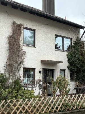 Charmante Doppelhaushälfte mit Garage und Süd-West Garten in beliebter Wohnlage