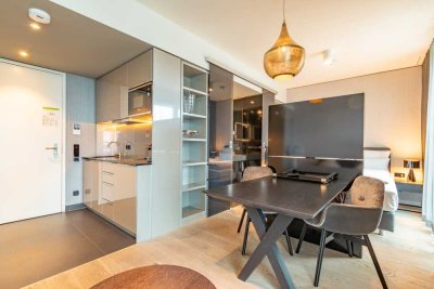 Voll möbliertes Studio-Apartment mit Balkon im 10. OG des „Cloud No 7“ über dem Milaneo in Stuttgart