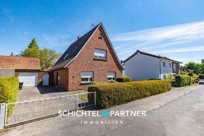 Ritterhude | Großes Zweifamilienhaus mit schönem Garten und zwei Garagen