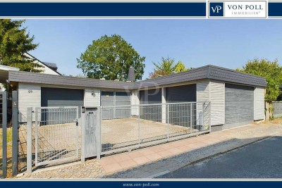 Modernisierter Bungalow mit Gartenbrunnen, 3 Garagen und Photovoltaikanlage