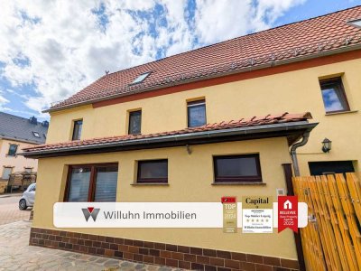 Wohnen, Vermieten und Arbeiten unter einem Dach: vielseitiges Gebäudeensemble mit Wasserblick!