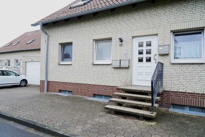 Helle 2-Zimmer-Eigentumswohnung im Erdgeschoss mit überdachter Terrasse und Garage