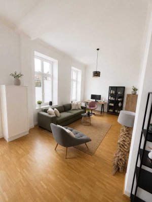 Wohnen im sanierten Denkmal: Wohnung mit Garten und EBK